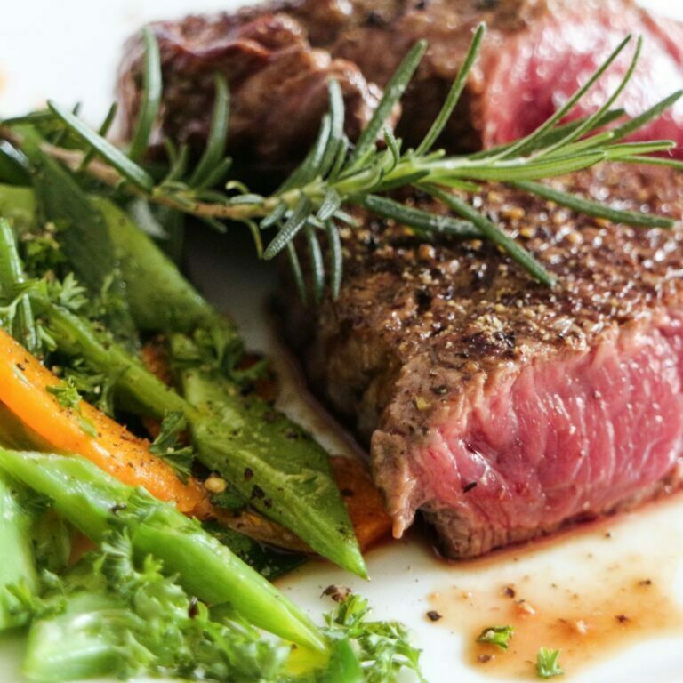 fillet with vegetables decorated with rosemary