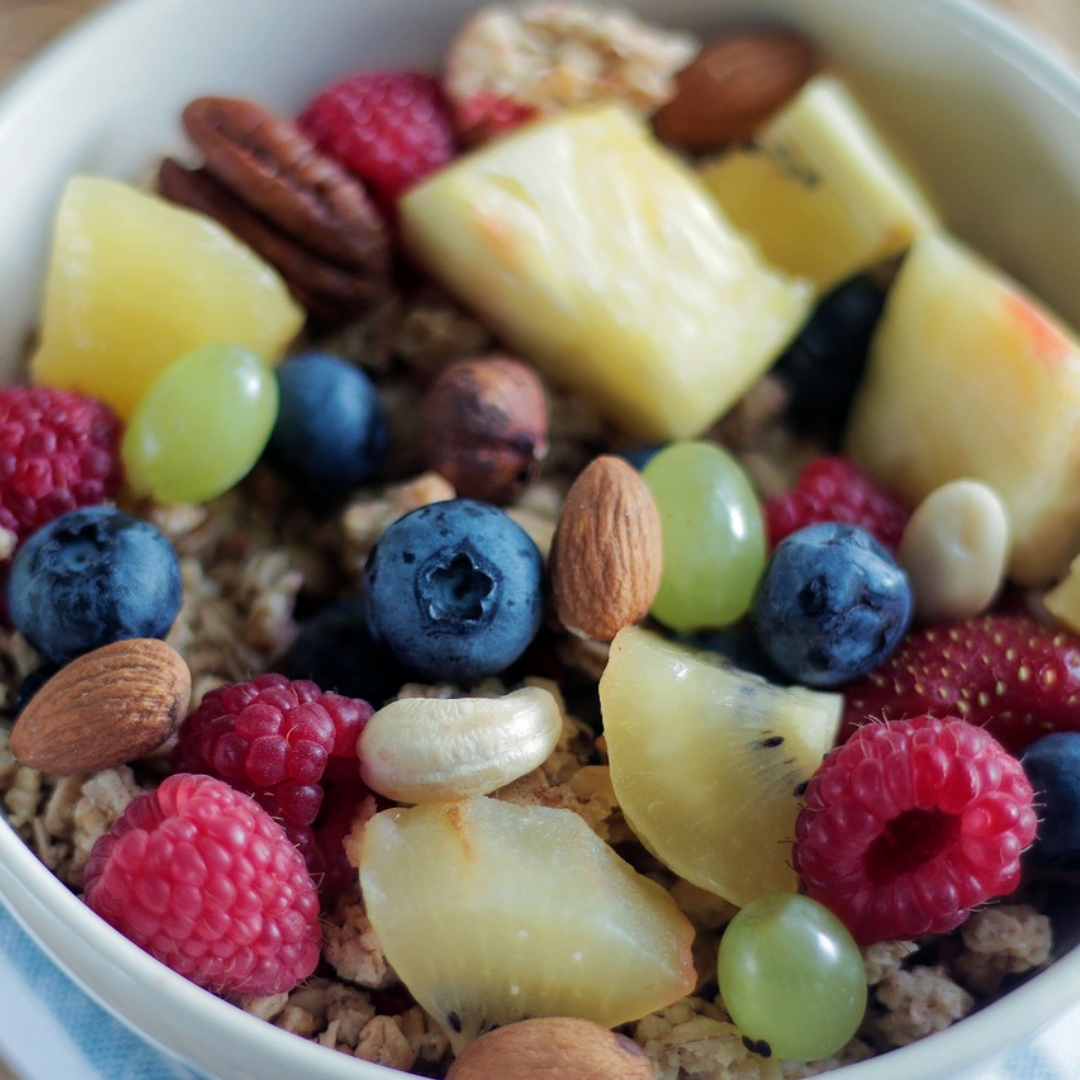 high fiber foods a bowl of mixed seeds, nuts and fruit